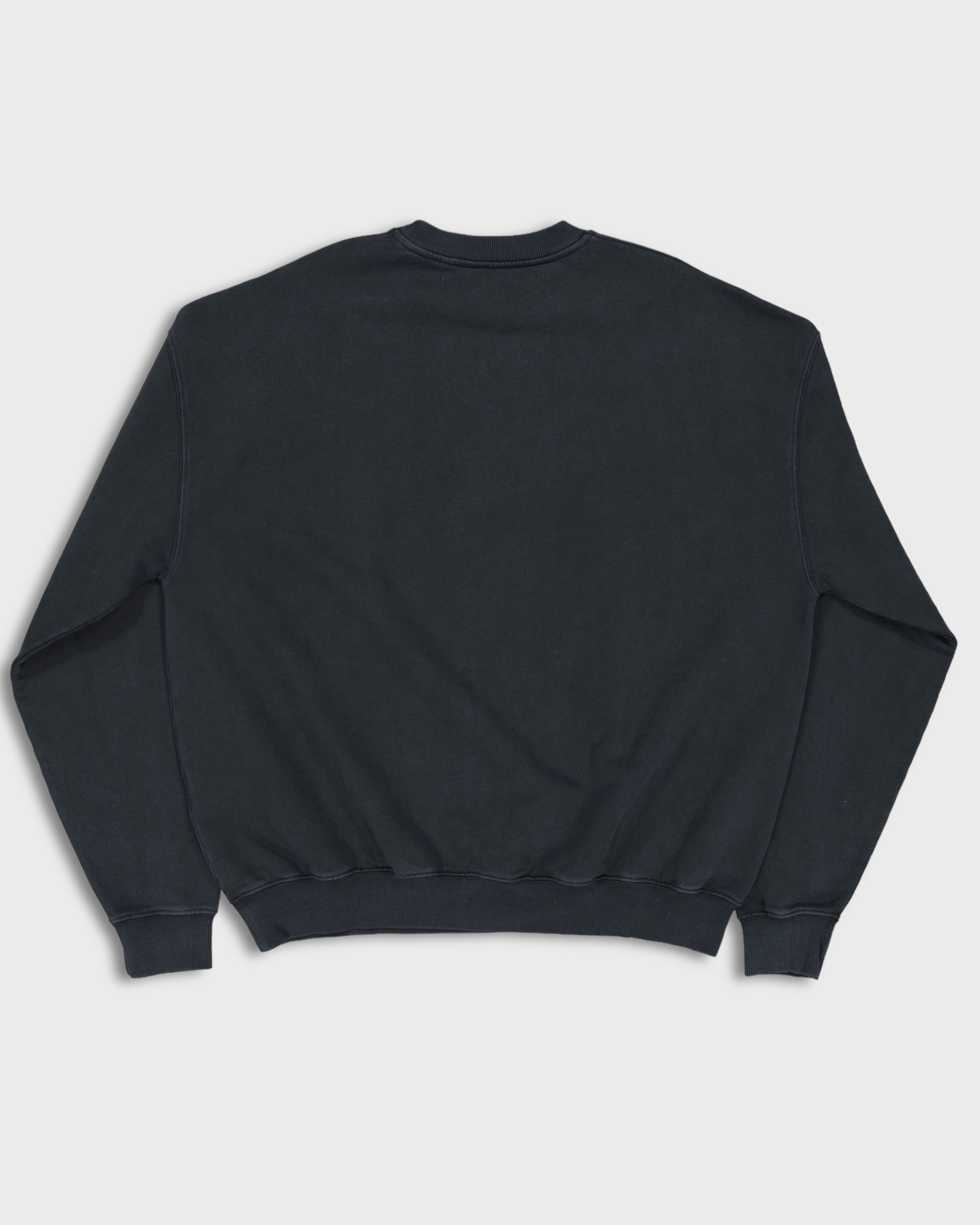 ‘AHEAD OF THE CURVE’ SWEATER